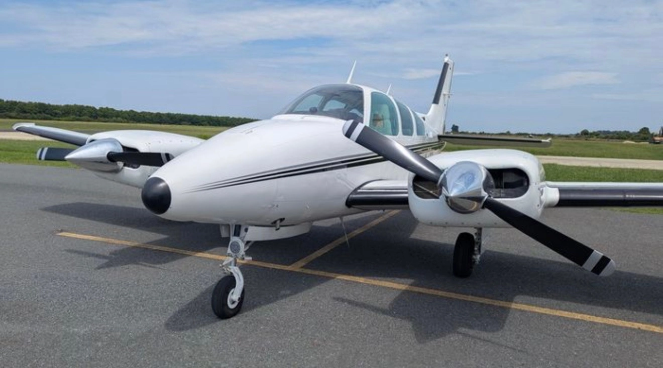 Front view of a Beechcraft 55 Baron multi engine aircraft